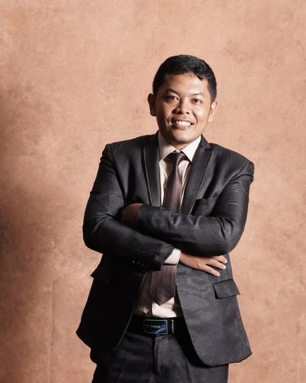 Foto Holong Napitupulu, M.Ti